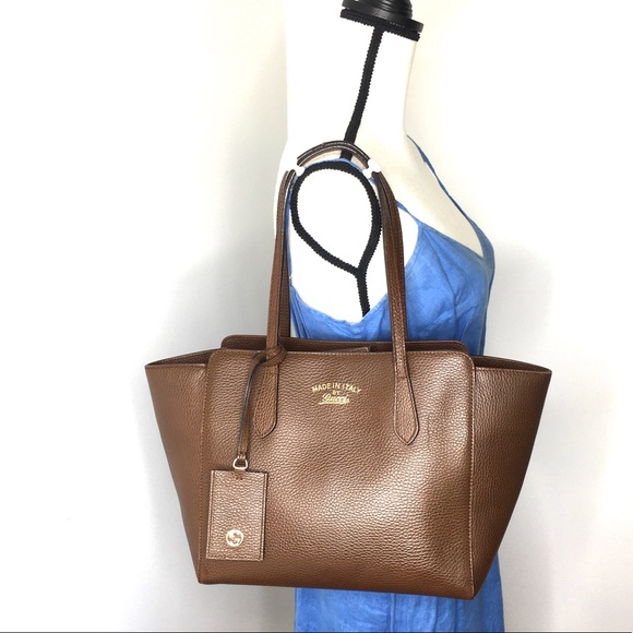 Gucci Handbags - Authentic Gucci brown leather swing tote